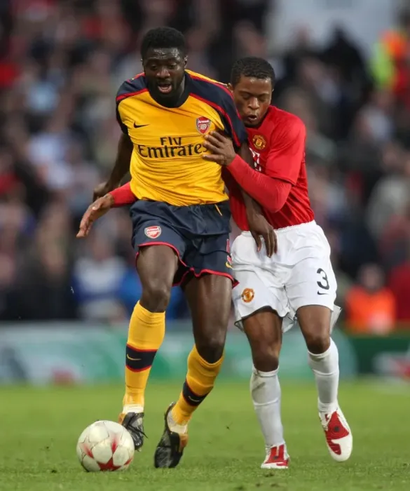 Framed Print : Kolo Toure (Arsenal) Patrice Evra (Man Utd)