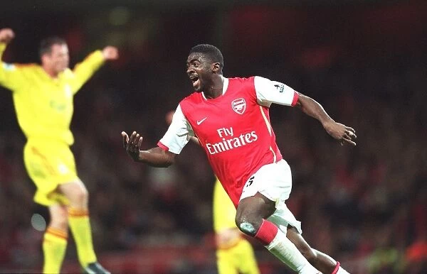 Kolo Toure celebrates scoring Arsenals 2nd goal