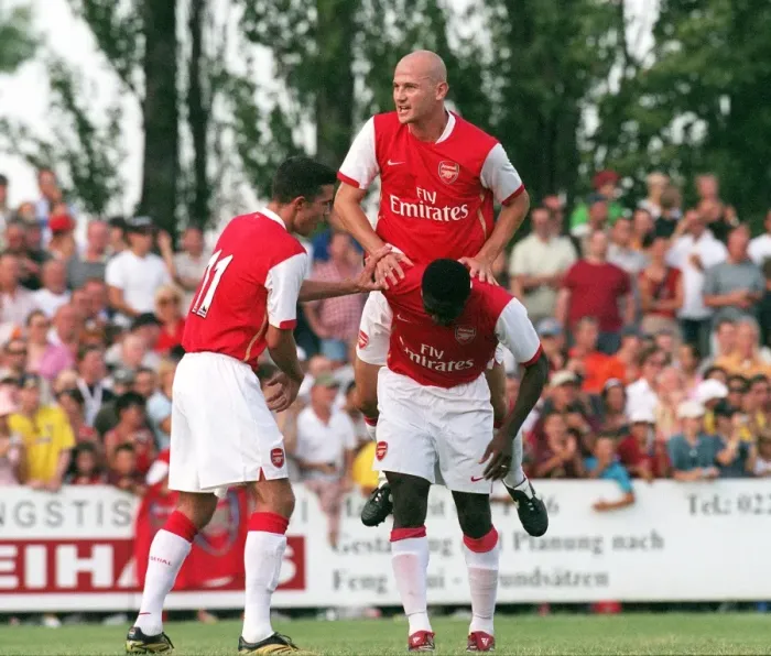 Framed Print : Kolo Toure celebrates scoring a goal for Arsenal with Pascal Cygan and Robin van Persie