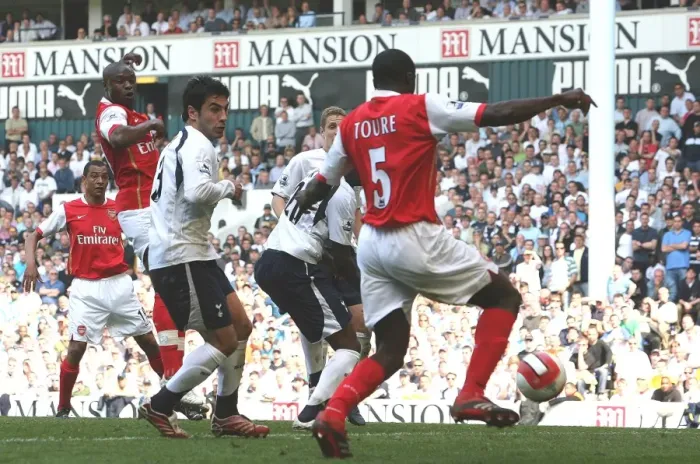 Framed Print : Kolo Toure shoots past Tottenham goalkeeper PAul Robinson to score the 1st Arsenal goal Framed Print : Kolo Toure shoots past Tottenham goalkeeper PAul Robinson to score the 1st Arsenal goal