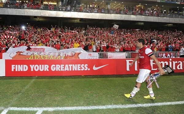 SO KON PO, HONG KONG - JULY 29: Andre Santos waves to the Arsenal fans after the pre-season Asian Tour friendly match