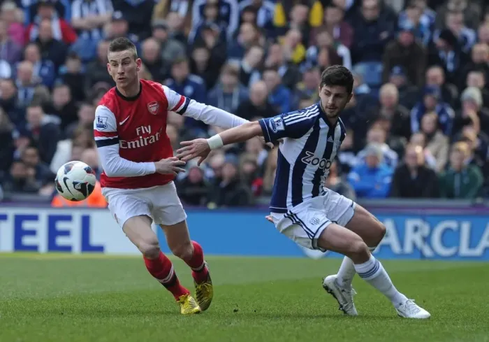Framed Print : Koscielny Stands Firm Against Long: West Bromwich Albion vs Arsenal, Premier League 2012-13