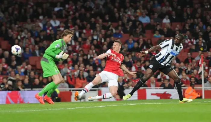 Framed Print : Koscielny Stuns Newcastle: The Thrilling Moment Arsenal's Defender Scores Past Krul and Sissoko