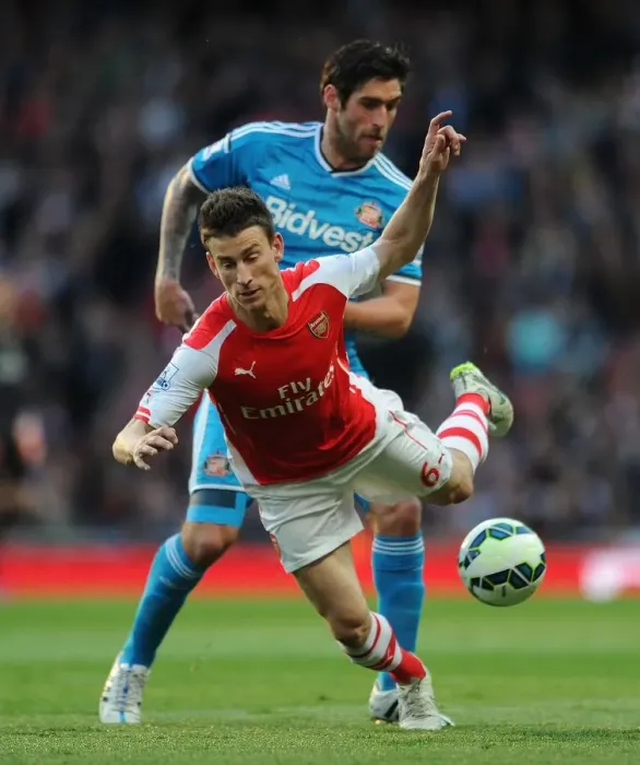 Framed Print : Koscielny vs. Graham: A Premier League Showdown at Emirates Stadium