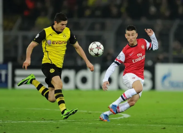 Framed Print : Koscielny vs Lewandowski: A Battle at the Heart of Borussia Dortmund vs Arsenal (UEFA Champions League, 2013)