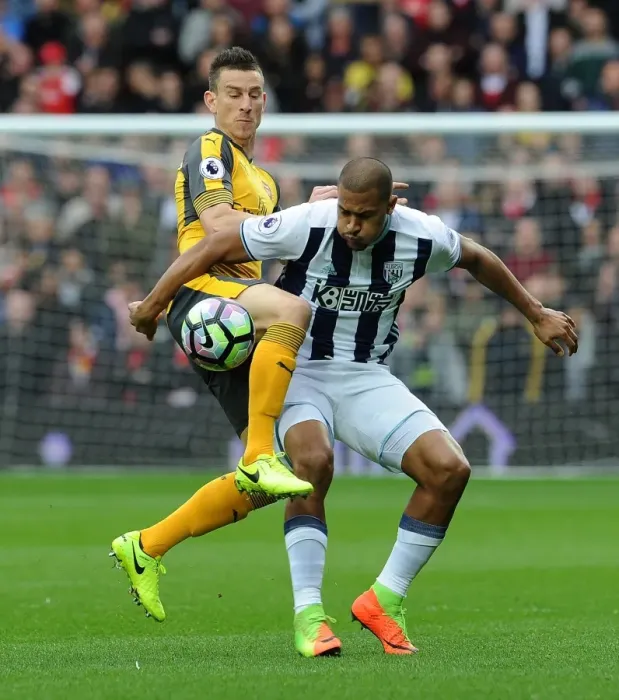 Framed Print : Koscielny vs Rondon: A Premier League Battle - Clash at The Hawthorns (West Bromwich Albion vs Arsenal 2016-17)