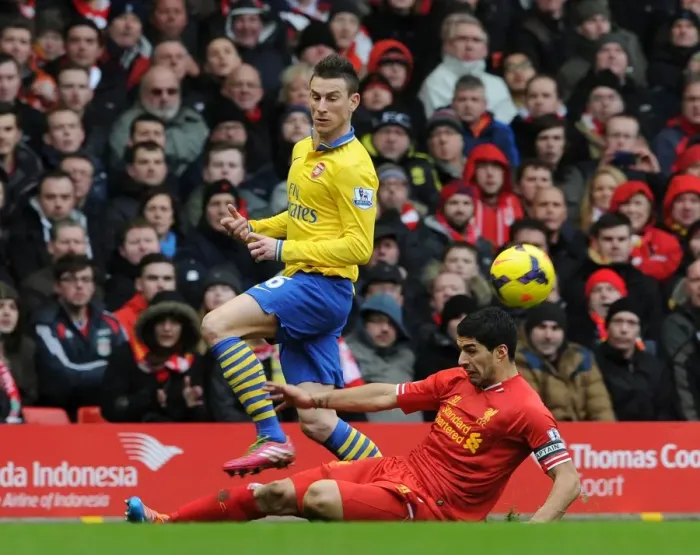Framed Print : Koscielny vs Suarez: Intense Battle at Anfield (Liverpool v Arsenal, 2013-14) Framed Print : Koscielny vs Suarez: Intense Battle at Anfield (Liverpool v Arsenal, 2013-14)