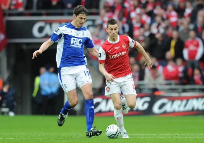 Framed Print : Koscielny's Heartbreak: Zigic Scores Twice as Birmingham City Upsets Arsenal in Carling Cup Final