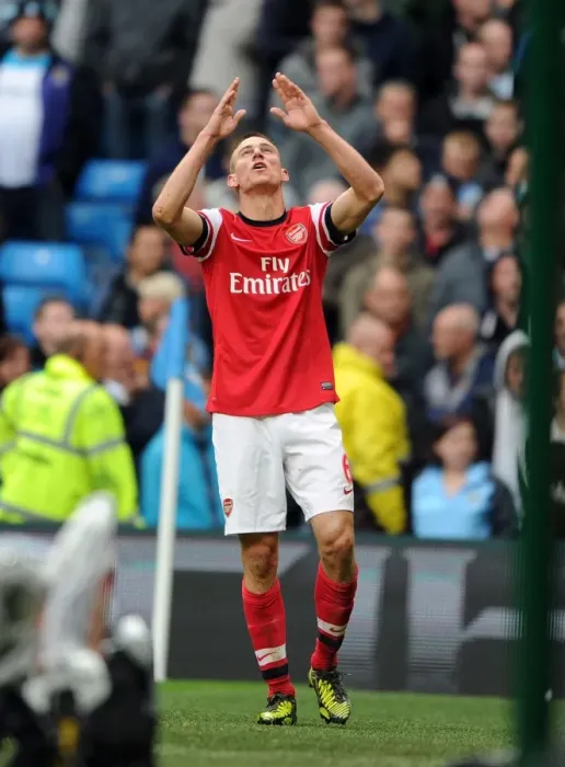 Framed Print : Koscielny's Stunner: Manchester City 1-1 Arsenal in Premier League Thriller
