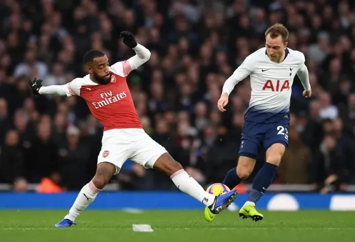 Framed Print : Lacazette Outsmarts Eriksen: Arsenal's Star Forward Scores Stunning Goal Against Tottenham