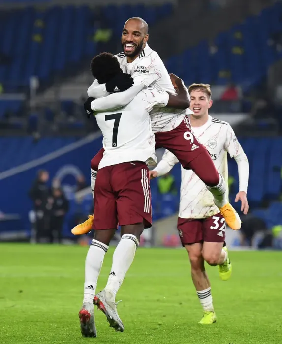 Framed Print : Lacazette and Saka Celebrate Goal: Brighton & Hove Albion vs. Arsenal, Premier League 2020-21