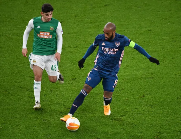 Framed Print : Lacazette Scores Alone: Emirates Stadium's Empty Stands - Arsenal vs. SK Rapid Wien, UEFA Europa League 2020-21