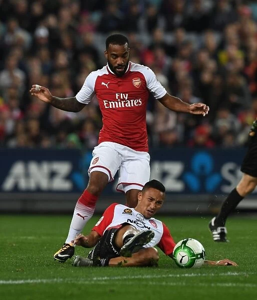 Lacazette vs. Baccus: AFC Pre-Season Showdown - Arsenal's Star Forward Clashes with Western Sydney Wanderers Defender (Sydney 2017)