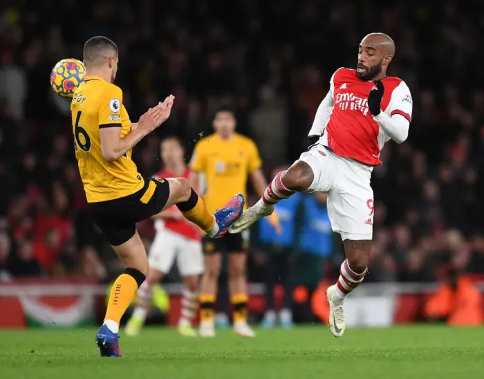 Framed Print : Lacazette vs. Coady: A Premier League Showdown at the Emirates Framed Print : Lacazette vs. Coady: A Premier League Showdown at the Emirates