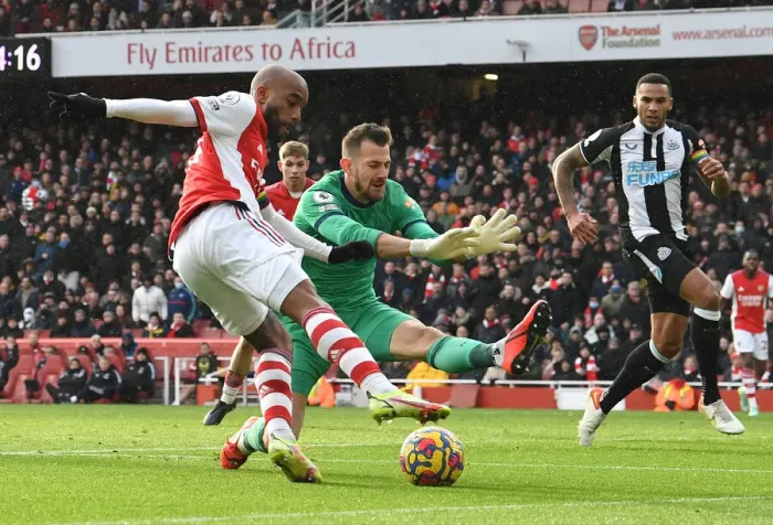 Framed Print : Lacazette vs Dubravka: A Premier League Battle at Emirates Stadium - Arsenal vs Newcastle United