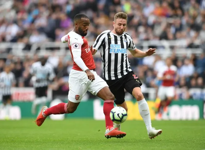 Framed Print : Lacazette vs. Dummett: A Football Rivalry Unfolds at St. James Park Framed Print : Lacazette vs. Dummett: A Football Rivalry Unfolds at St. James Park