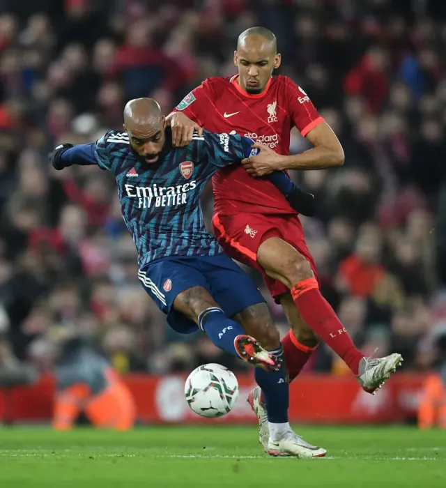 Framed Print : Lacazette vs Fabinho: A Battle in the Carabao Cup Semi-Final Between Liverpool and Arsenal Framed Print : Lacazette vs Fabinho: A Battle in the Carabao Cup Semi-Final Between Liverpool and Arsenal