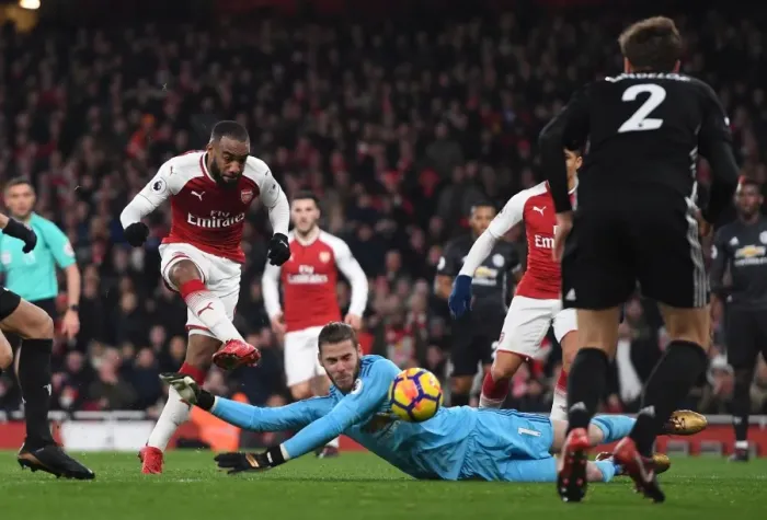Framed Print : Lacazette vs. De Gea: Premier League Showdown at Emirates Stadium