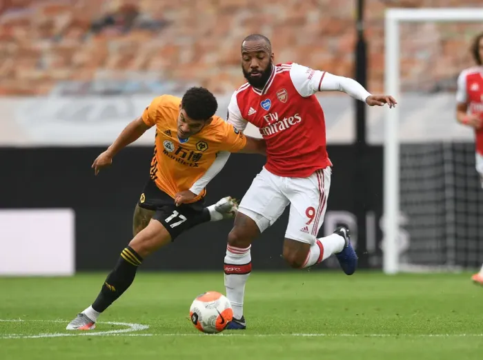 Framed Print : Lacazette vs Gibbs-White: A Battle in the Premier League Clash between Wolverhampton and Arsenal Framed Print : Lacazette vs Gibbs-White: A Battle in the Premier League Clash between Wolverhampton and Arsenal