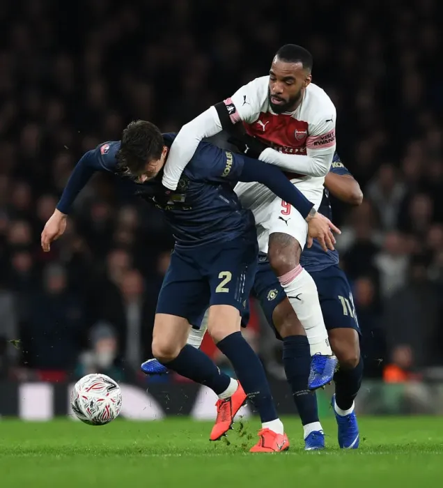 Framed Print : Lacazette vs Lindelof: A FA Cup Showdown at the Emirates