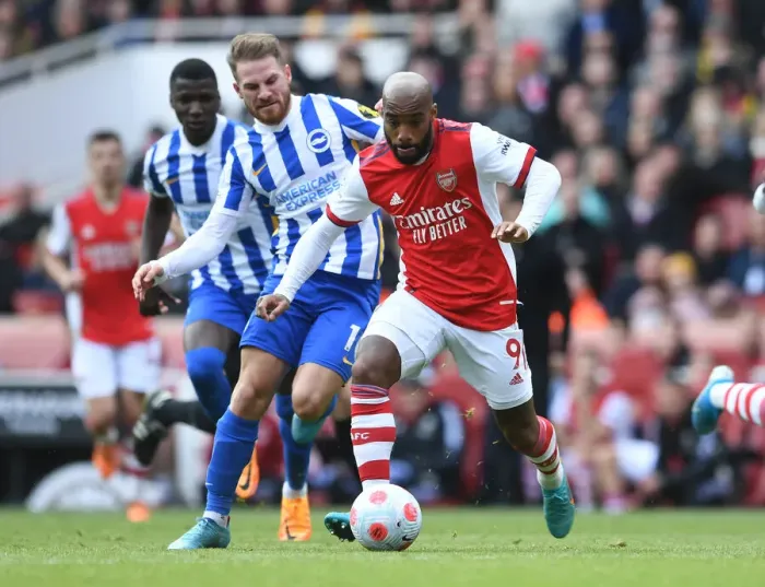 Framed Print : Lacazette vs. Mac Allister: A Premier League Showdown at the Emirates