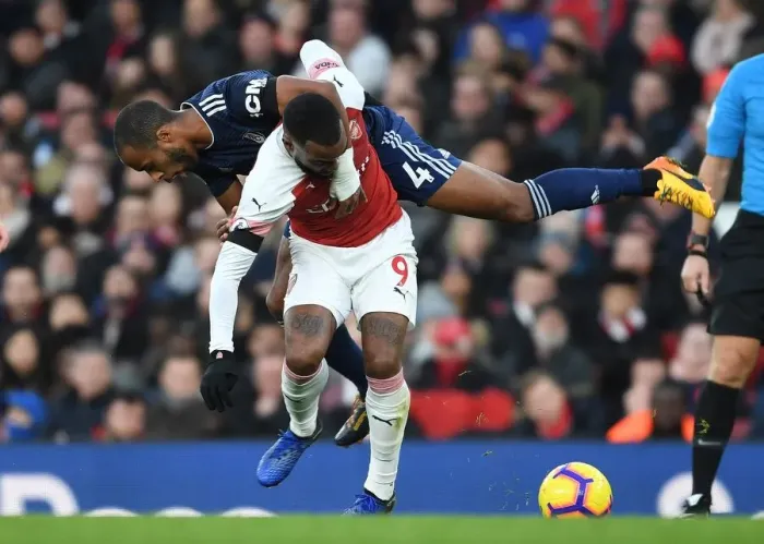 Framed Print : Lacazette vs Odoi: A Premier League Showdown at the Emirates