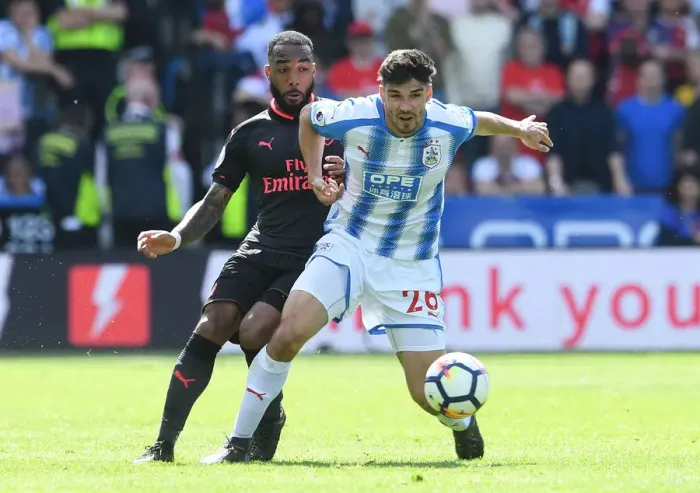 Framed Print : Lacazette vs Schindler: Intense Battle in Huddersfield Town vs Arsenal Premier League Clash Framed Print : Lacazette vs Schindler: Intense Battle in Huddersfield Town vs Arsenal Premier League Clash