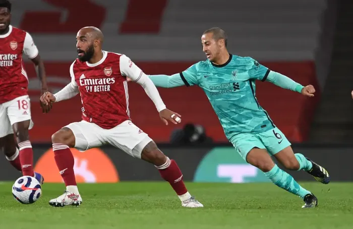 Framed Print : Lacazette vs. Thiago: The Premier League Rivalry - Arsenal vs. Liverpool Showdown (2020-21) Framed Print : Lacazette vs. Thiago: The Premier League Rivalry - Arsenal vs. Liverpool Showdown (2020-21)