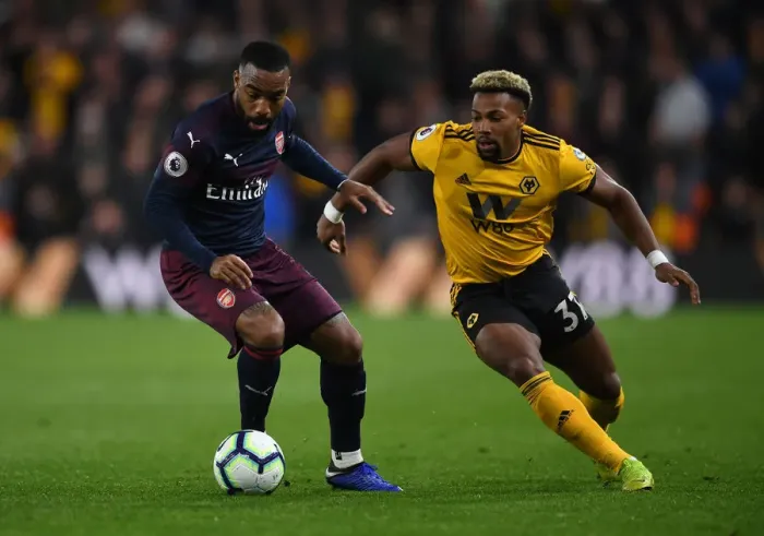 Framed Print : Lacazette vs Traore: Wolverhampton Wanderers vs Arsenal FC, Premier League Showdown (2018-19)