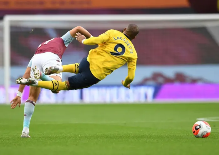 Framed Print : Lacazette vs Trezeguet: A Premier League Face-Off at Villa Park
