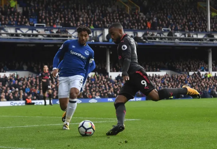 Framed Print : Lacazette vs. Williams: Intense Moment at Goodison Park - Everton vs. Arsenal, Premier League 2017-18