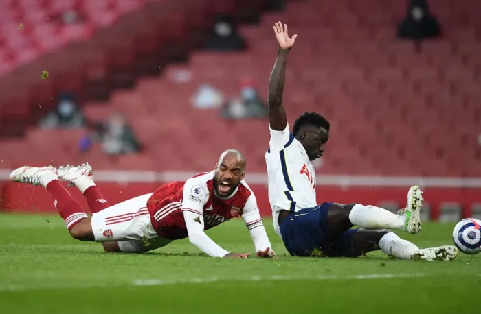 Framed Print : Lacazette's Passionate Reaction to Controversial Penalty Call in Arsenal vs. Tottenham Clash Framed Print : Lacazette's Passionate Reaction to Controversial Penalty Call in Arsenal vs. Tottenham Clash