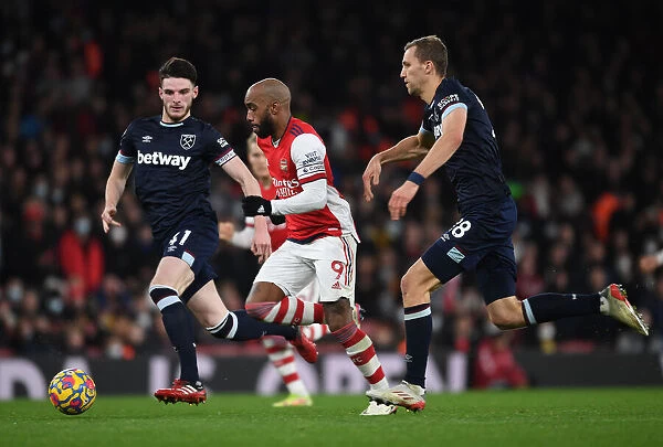 Lacazette's Slick Moves: Outsmarting Rice and Soucek in the Thrilling Arsenal vs. West Ham Showdown (2021-22)