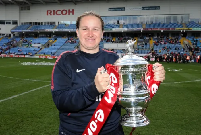 Framed Print : Laura Harvey (Arsenal Manager) with the FA Cup Trophy. Arsenal Ladies 2: 0 Bristol Academy