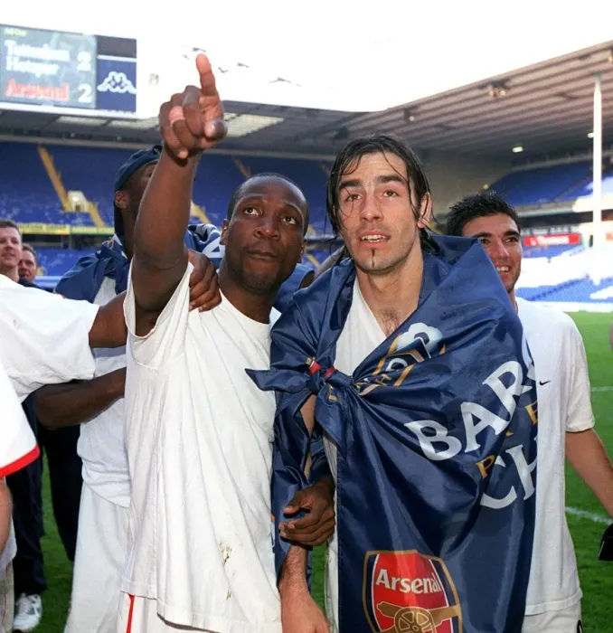 Framed Print : Lauren and Robert Pires (Arsenal) celebrate winning the league Framed Print : Lauren and Robert Pires (Arsenal) celebrate winning the league
