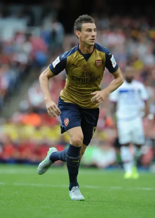 Framed Print : Laurent Koscielny: In Action for Arsenal Against Olympique Lyonnais at Emirates Cup 2015 / 16