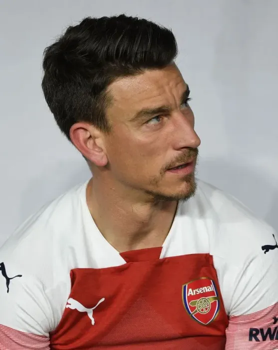 Framed Print : Laurent Koscielny in Action: Arsenal vs Al-Nasr Dubai SC (2018-19)