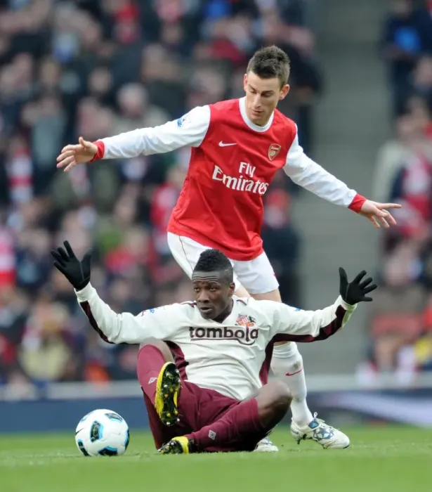 Framed Print : Laurent Koscielny (Arsenal) Asamoah Gyan (Sunderland). Arsenal 0: 0 Sunderland