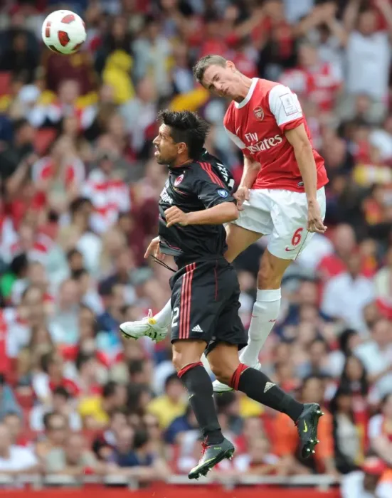 Framed Print : Laurent Koscielny (Arsenal) Borriello (Milan). Arsenal 1: 1 AC Milan. Emirates Cup Framed Print : Laurent Koscielny (Arsenal) Borriello (Milan). Arsenal 1: 1 AC Milan. Emirates Cup