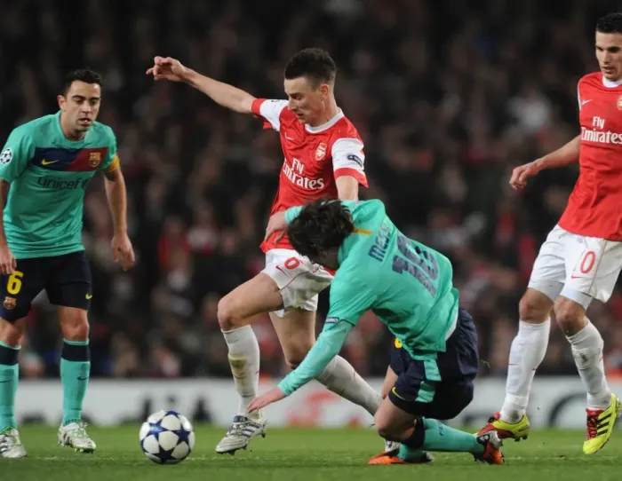 Framed Print : Laurent Koscielny (Arsenal) Lionel Messi (Barcelona). Arsenal 2: 1 Barcelona