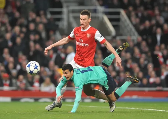 Framed Print : Laurent Koscielny (Arsenal) Pedro Rodriguez (Barcelona). Arsenal 2: 1 Barcelona