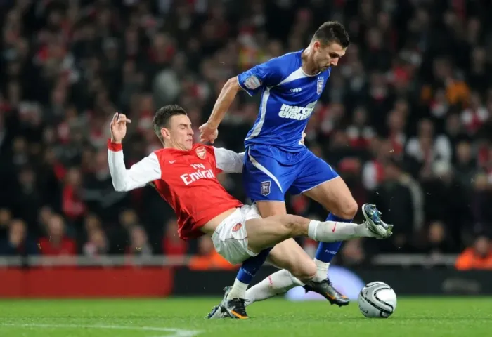 Framed Print : Laurent Koscielny (Arsenal) Tamas Priskin (Ipswich). Arsenal 3: 0 Ipswich Town Framed Print : Laurent Koscielny (Arsenal) Tamas Priskin (Ipswich). Arsenal 3: 0 Ipswich Town