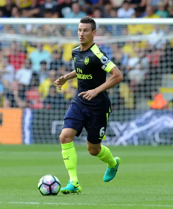 Framed Print : Laurent Koscielny (Arsenal). Watford 1: 3 Arsenal. Premier League. Vicarage Road, Watford