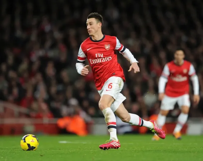 Framed Print : Laurent Koscielny: Arsenal's Defensive Powerhouse vs. Everton (2013-14)