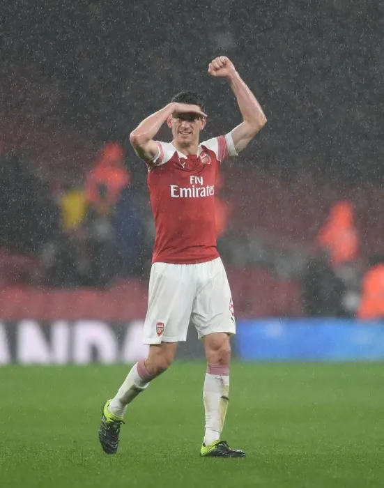 Framed Print : Laurent Koscielny: Arsenal's Defiant Figure in the Face of Manchester United