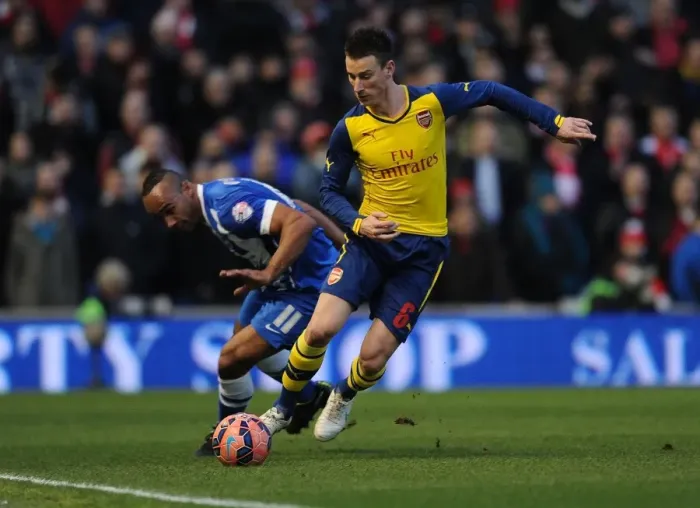 Framed Print : Laurent Koscielny Battles Past Chris O'Grady: Arsenal vs. Brighton & Hove Albion, FA Cup 2015