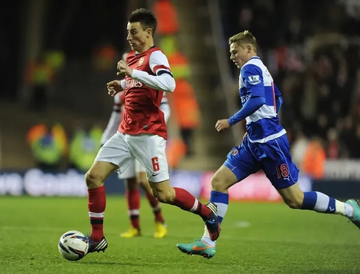 Framed Print : Laurent Koscielny Breaks Past Simon Church: Arsenal's Capital One Cup Victory over Reading (October 2012)