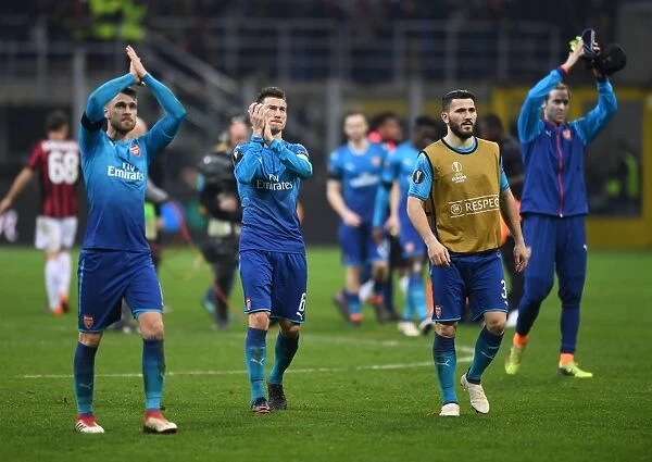 Laurent Koscielny Celebrates with Arsenal Fans after AC Milan Clash in Europa League