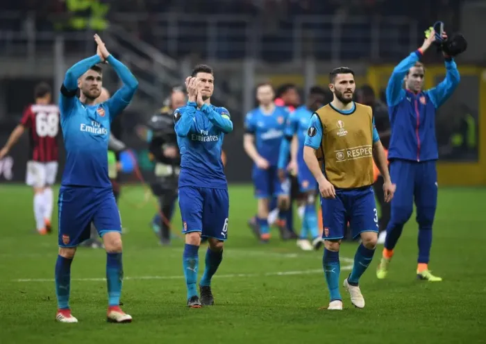 Framed Print : Laurent Koscielny Celebrates with Arsenal Fans after AC Milan Clash in Europa League