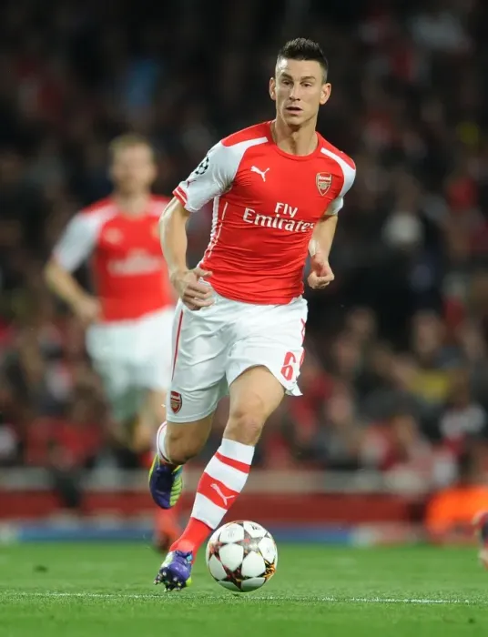 Framed Print : Laurent Koscielny Focused During Arsenal's UEFA Champions League Clash Against Besiktas (2014) Framed Print : Laurent Koscielny Focused During Arsenal's UEFA Champions League Clash Against Besiktas (2014)